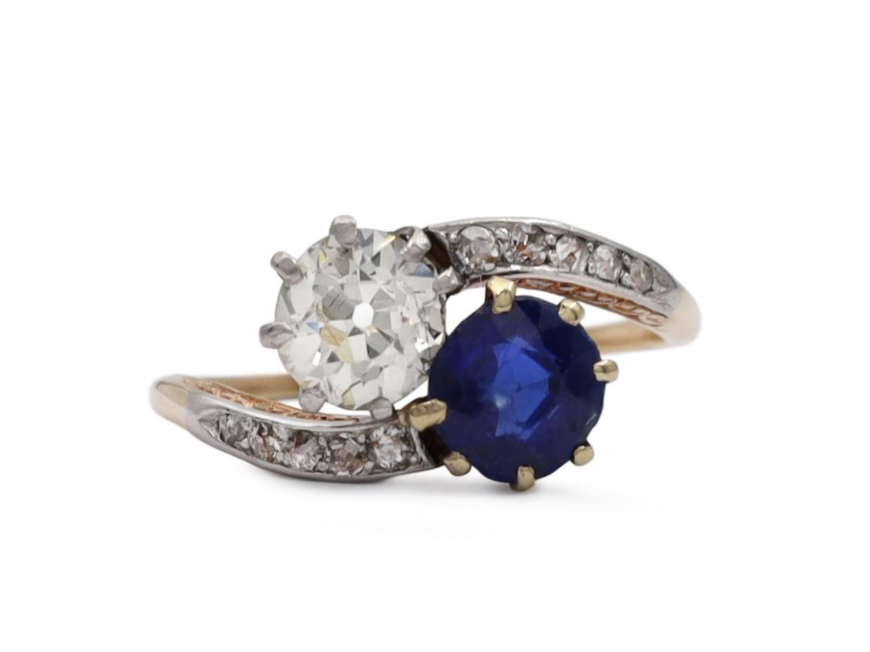 Edwardian sapphire and diamond two stone twist ring in gold