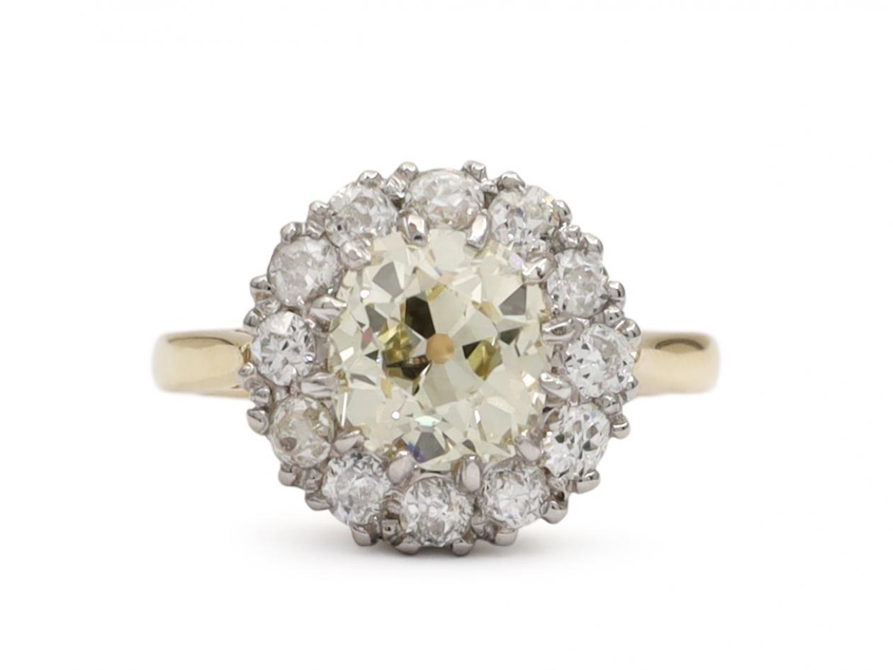 Antique coronet cluster ring with a 1.53ct pale yellow diamond centre