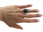 Retro green tourmaline and diamond oval cluster ring in gold and platinum