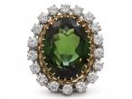 Retro green tourmaline and diamond oval cluster ring in gold and platinum