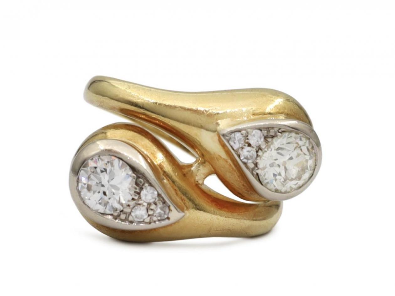 Retro diamond set bypass ring in 18kt yellow gold