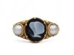 Georgian onyx butterfly cameo and pearl mourning ring in gold