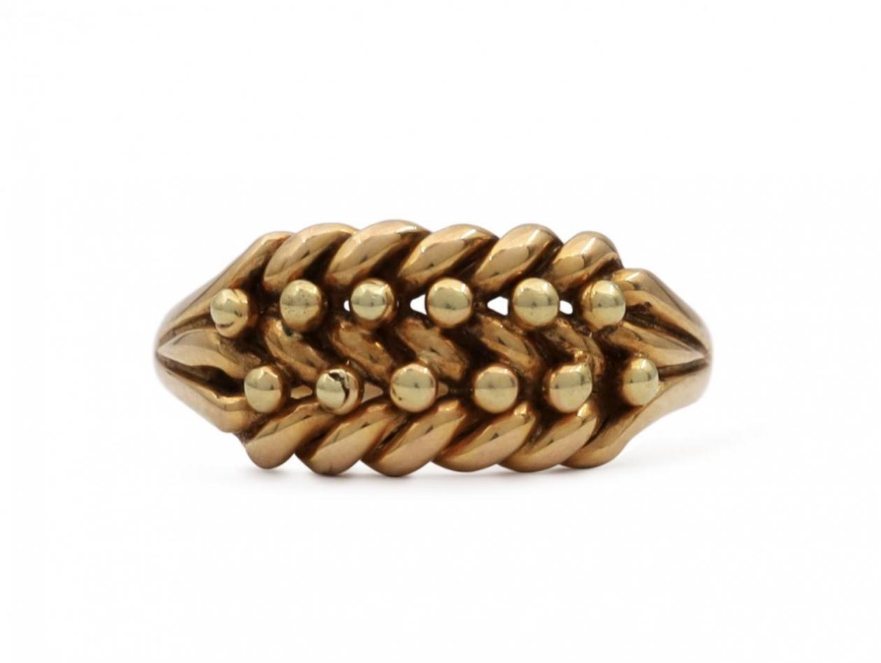 1908 braided keeper ring in 18kt gold by the Kinsey Bros & Patrick
