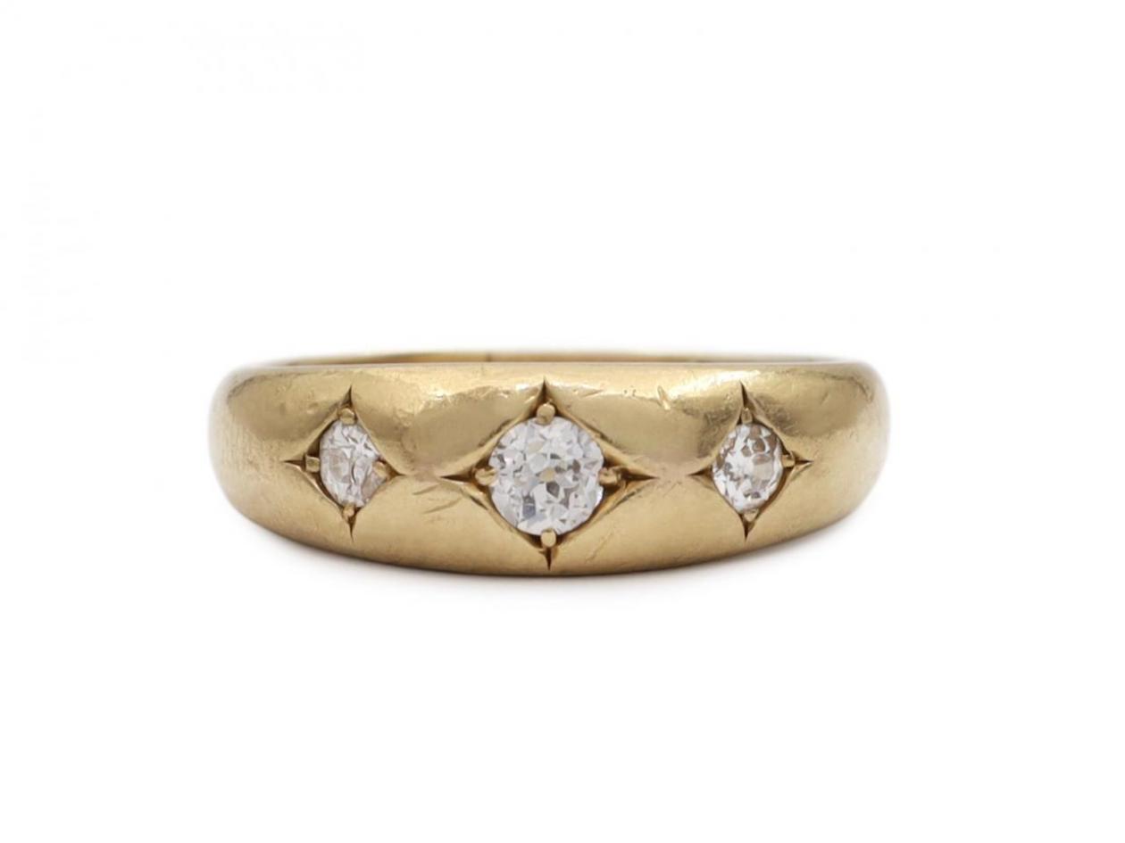 1902 diamond three stone gypsy ring in 18kt yellow gold