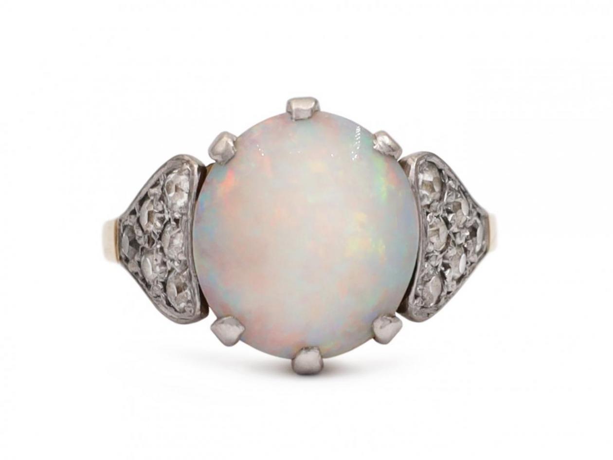 1950s solitaire opal and diamond ring in platinum and 18kt yellow gold