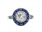French Art Deco diamond and sapphire target engagement ring in platinum