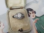 Art Deco diamond set bombe solitaire engagement ring in platinum