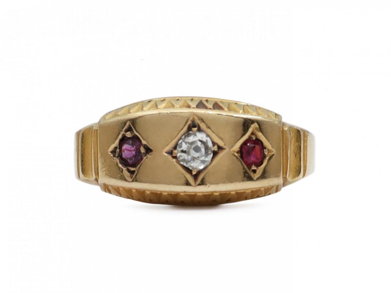 1883 diamond and ruby three stone gypsy ring in 18kt yellow gold