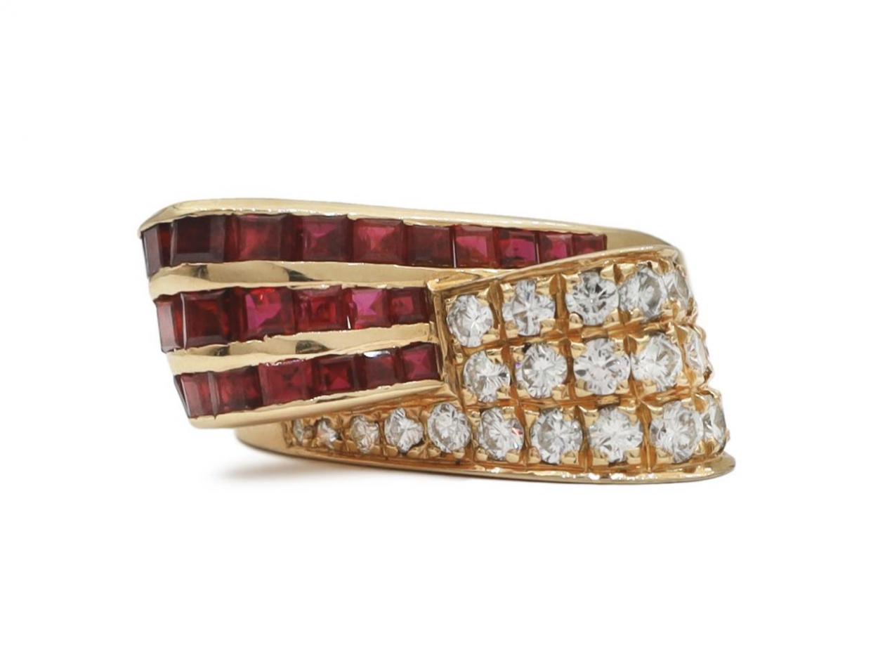 Vintage ruby and diamond stylised bow ring in gold