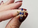 Edwardian sapphire and diamond diagonal navette cluster ring