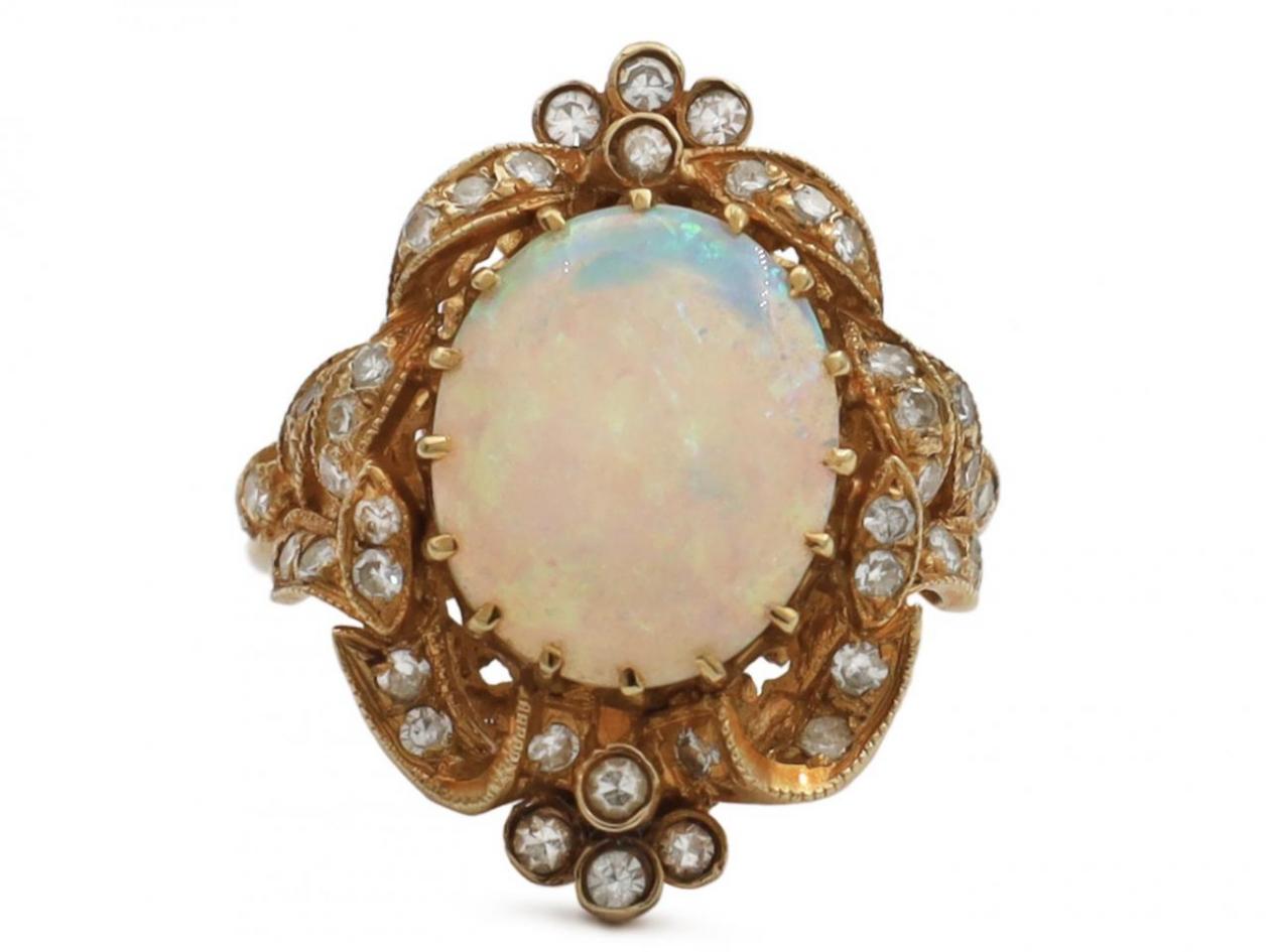 Antique style opal and diamond fancy cluster ring in 18kt yellow gold