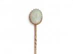 Antique oval opal stick pin in yellow gold