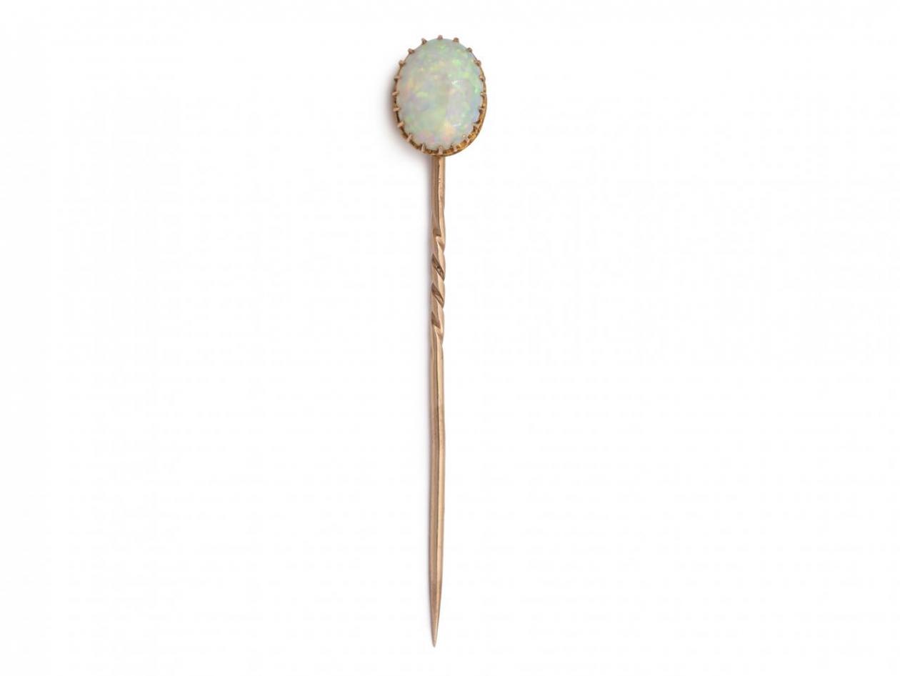 Antique oval opal stick pin in yellow gold