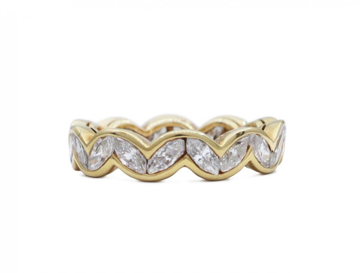 Modern marquise cut diamond full eternity ring in gold