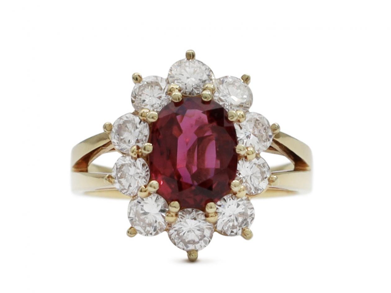 Ruby and diamond coronet cluster engagement ring in gold