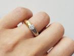 Contemporary 18kt yellow gold and platinum diamond solitaire ring
