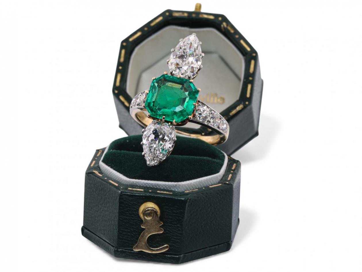 Emerald and diamond engagement ring