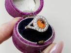 Art Deco style fire opal and diamond halo cluster ring