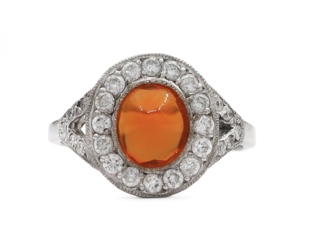 Art Deco style fire opal and diamond halo cluster ring