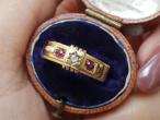 Antique diamond and ruby buckle ring in 18kt yellow gold
