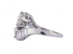 1950s platinum diamond two-stone 'toi et moi' twist ring with baguette shoulders – Matthew Weldon