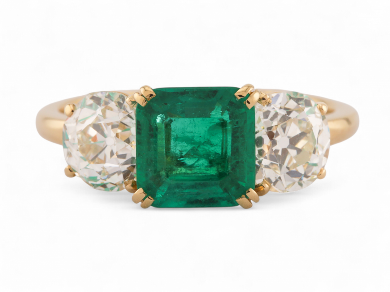 Edwardian platinum three stone ring with square emerald and Old European cut diamonds – Matthew Weldon