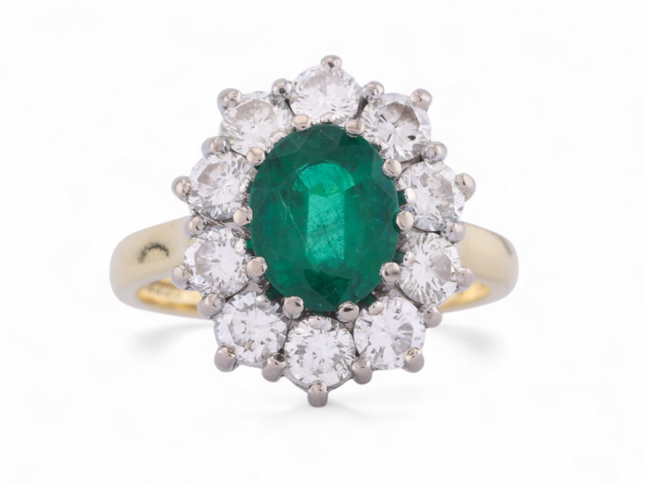 Vintage Zambian emerald and diamond cluster ring from Courtville Antiques
