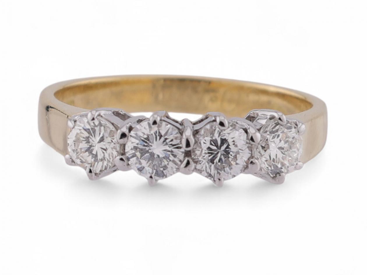 Vintage four stone diamond ring in 18kt yellow gold