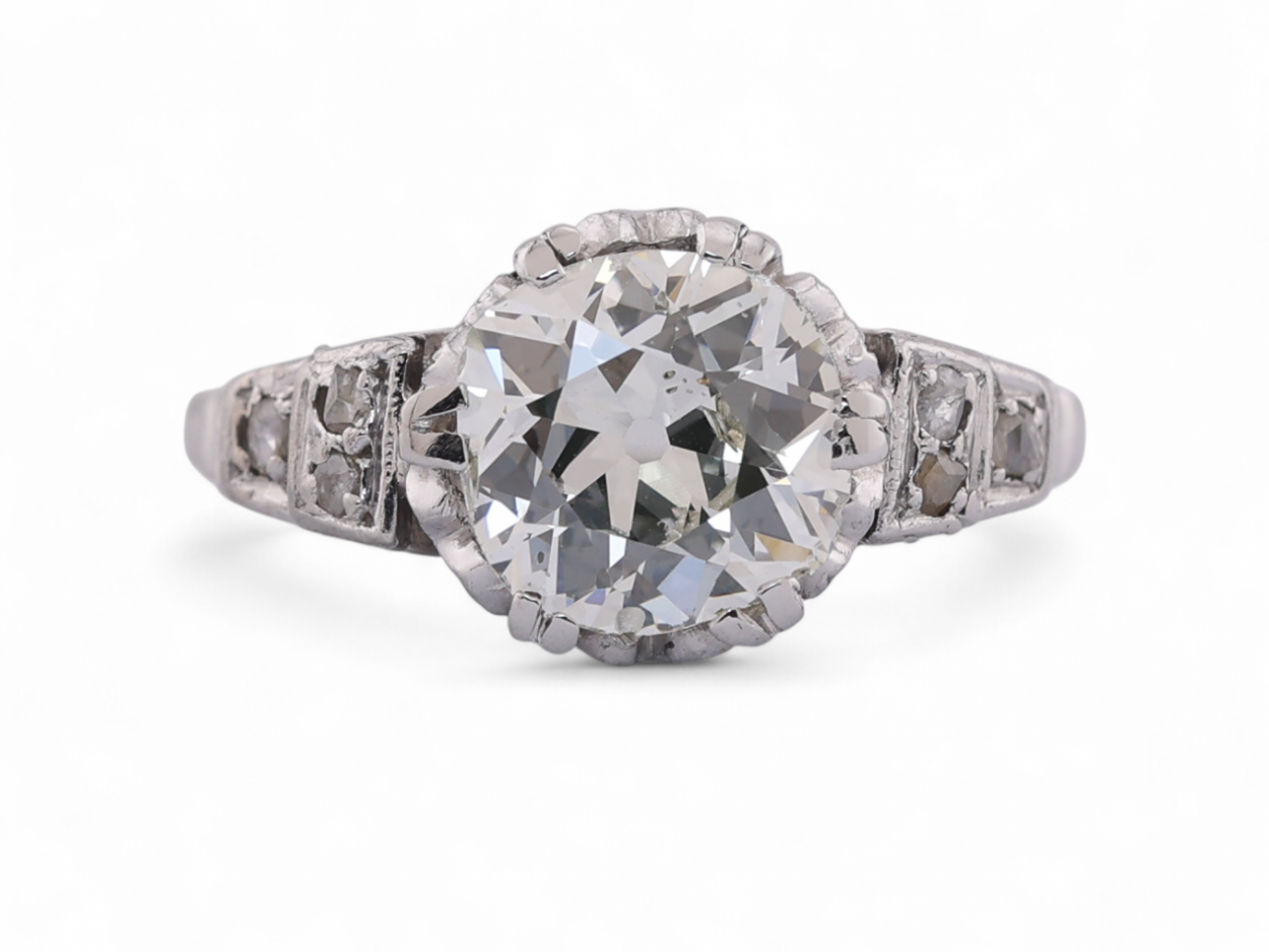 Mid-20th century platinum solitaire ring with 1.94ct old mine cut diamond