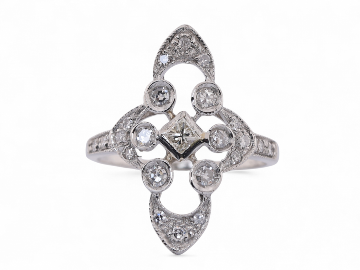 Vintage geometric diamond panel ring in platinum with princess cut centre