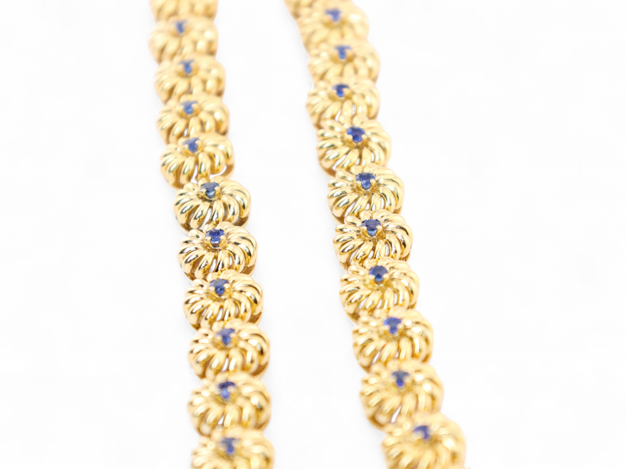 Vintage emerald ring with round cut emerald on reeded 18kt yellow gold band