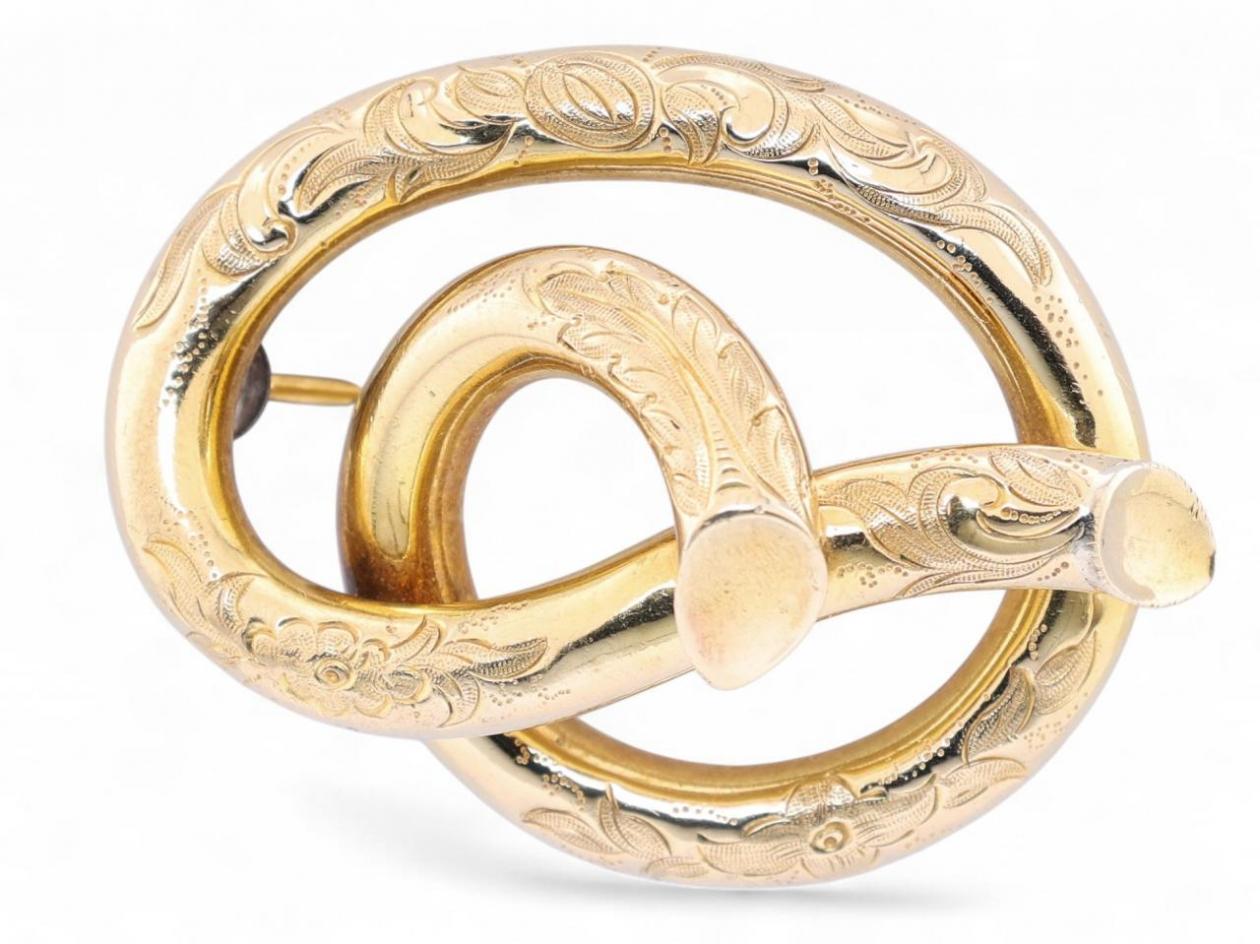 Antique Knotted Stem Brooch in Foliate Engraved 18kt Yellow Gold