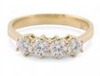 Modern 18kt gold diamond ring with estimated 1 carat total weight in F to H colour and SI clarity.