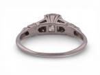 Art Deco Platinum Diamond Solitaire Ring with Baguette and Round Accents