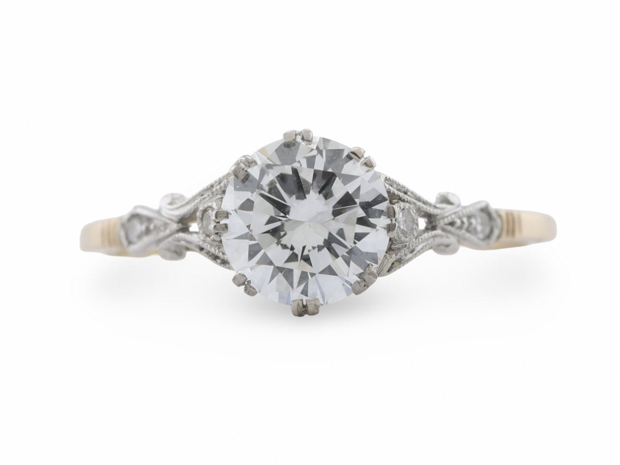 18ct Gold and Platinum Diamond Solitaire Ring with Scrollwork Shoulders