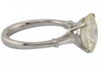 A platinum solitaire ring set with an old European cut