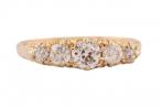 A five stone diamond ring in 18kt yellow gold