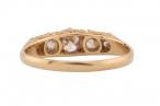 A five stone diamond ring in 18kt yellow gold