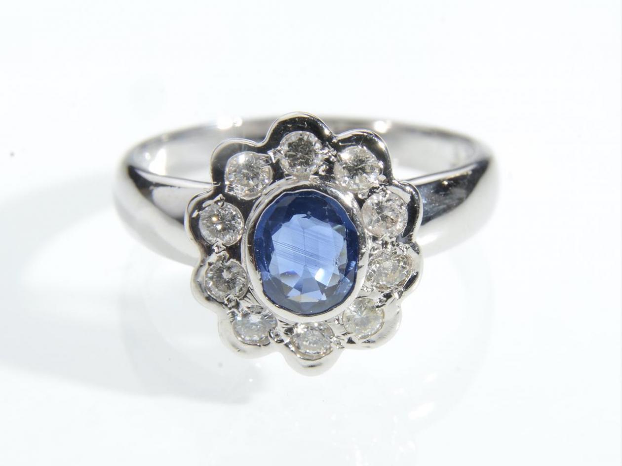Contemporary sapphire and diamond floral cluster ring