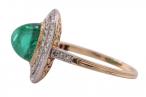 Edwardian Cabochon Emerald ring with tiered double diamond millgrain border