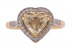 Modernist, heart shape fancy light yellow diamond cluster ring