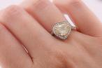 Modernist, heart shape fancy light yellow diamond cluster ring