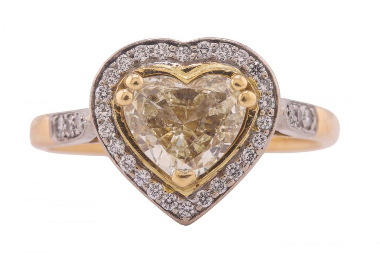 Modernist, heart shape fancy light yellow diamond cluster ring