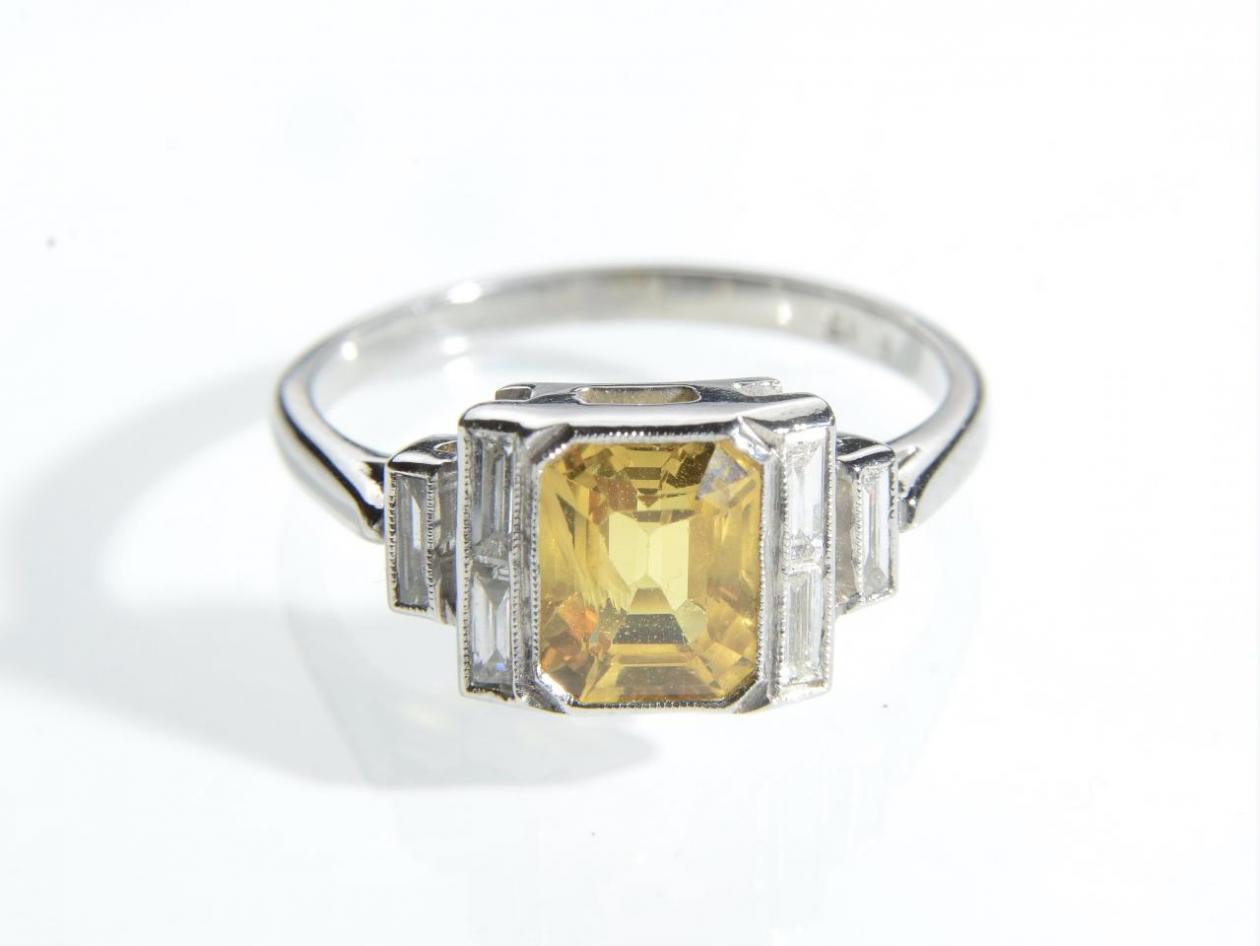 Fancy yellow sapphire and diamond Deco style ring in platinum
