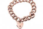 Vintage curb link rose gold bracelet with heart shape locket