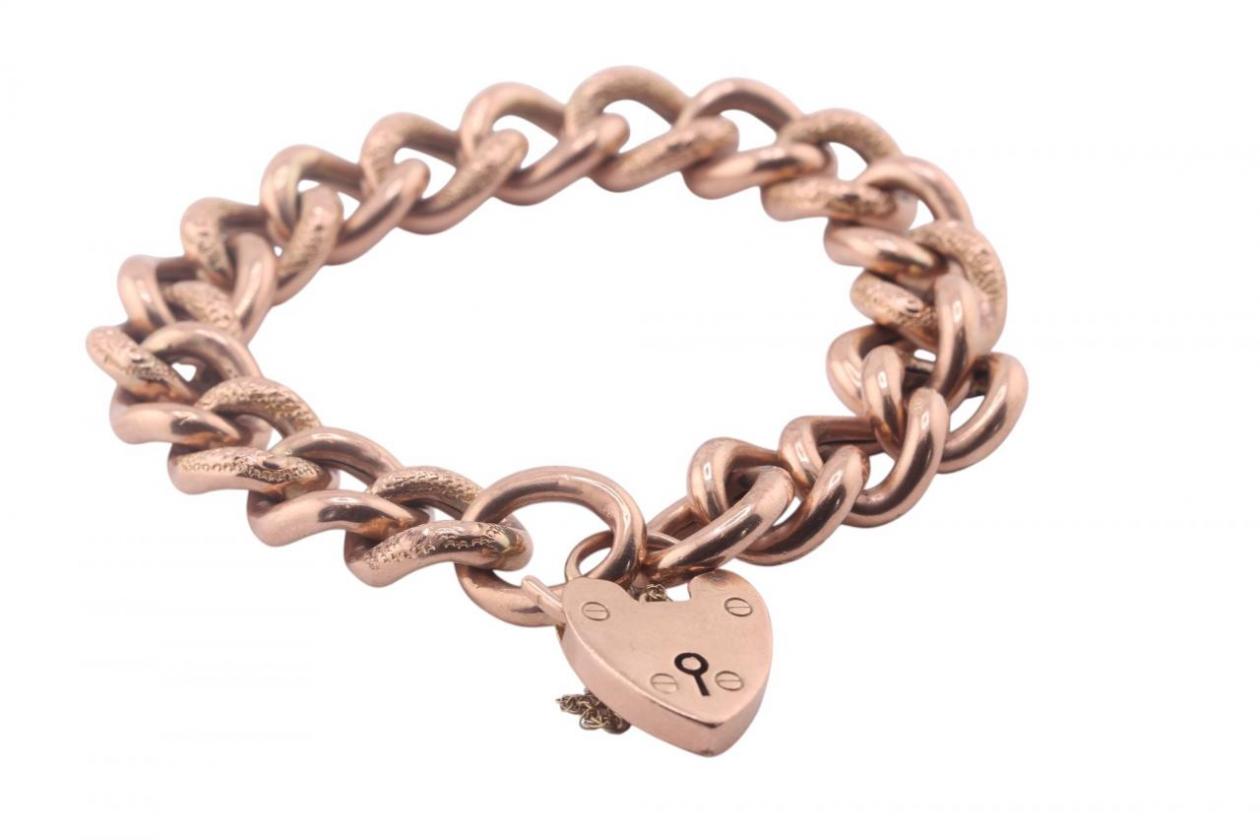 Vintage curb link rose gold bracelet with heart shape locket