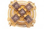 VICTORIAN CELTIC REVIVAL SMOKY QUARTZ AND SEED PEARL CROSS BROOCH, CIRCA 1880