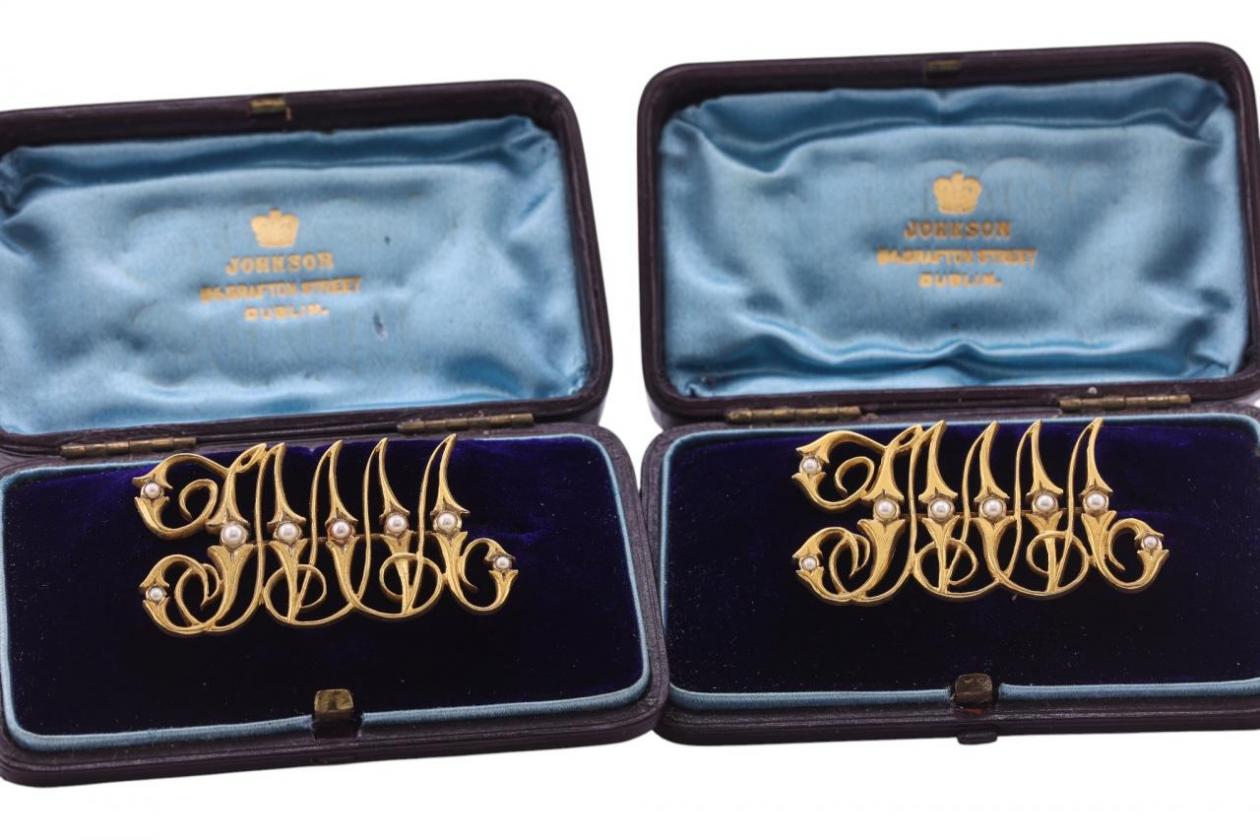LATE VICTORIAN GOLD AND SEED-PEARL MONOGRAM BROOCHES, CIRCA 1890