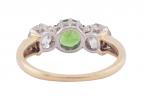 DEMANTOID GARNET AND DIAMOND THREE STONE RING, CIRCA 1960