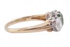DEMANTOID GARNET AND DIAMOND THREE STONE RING, CIRCA 1960